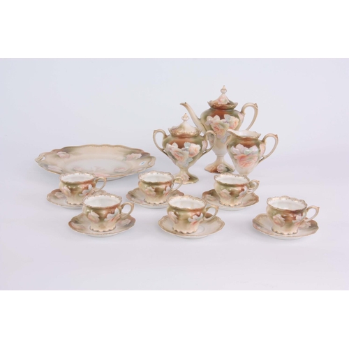 83 - AN EARLY 20TH CENTURY RS PRUSSIA PORCELAIN 16 PIECE COFFEE SET including coffee pot 18cm, cream jug,... 