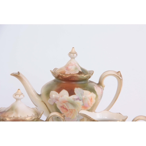 83 - AN EARLY 20TH CENTURY RS PRUSSIA PORCELAIN 16 PIECE COFFEE SET including coffee pot 18cm, cream jug,... 