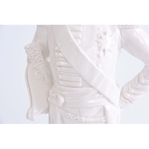 88 - 20TH CENTURY WHITE PORCELAIN FIGURE OF LORD NELSON standing on a base moulded as dominos - 37cm high... 