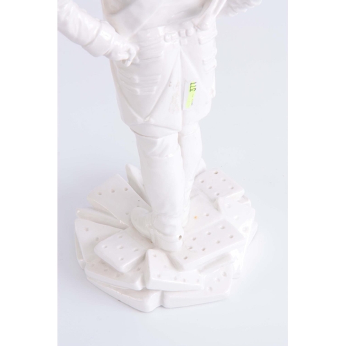 88 - 20TH CENTURY WHITE PORCELAIN FIGURE OF LORD NELSON standing on a base moulded as dominos - 37cm high... 