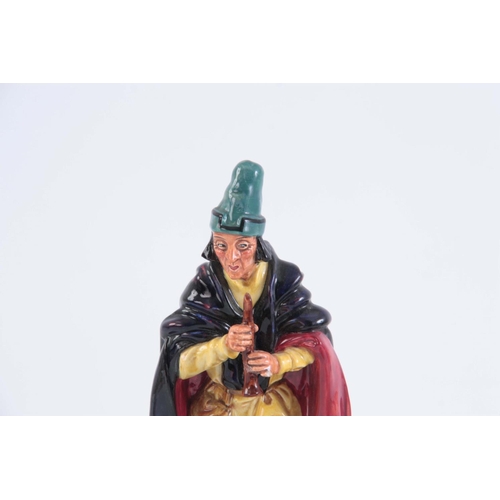 92 - A MID 20TH CENTURY ROYAL DOULTON FIGURINE, the pied piper, 23cm high x 9cm wide, together with a con... 