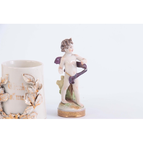 92 - A MID 20TH CENTURY ROYAL DOULTON FIGURINE, the pied piper, 23cm high x 9cm wide, together with a con... 