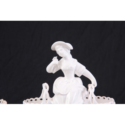 93 - A pair of 19th century Copeland white porcelain figural table salts modelled as a boy and a girl sat... 