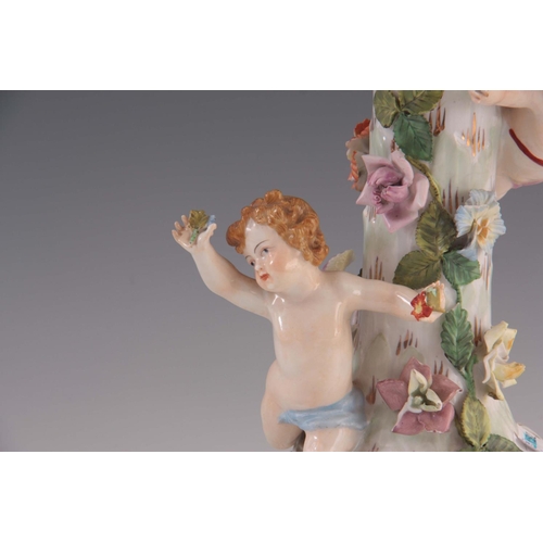 97 - TWO 19TH CENTURY DRESDEN PORCELAIN COMPOTE CENTREPIECES with figural cherub bases and pierced basket... 