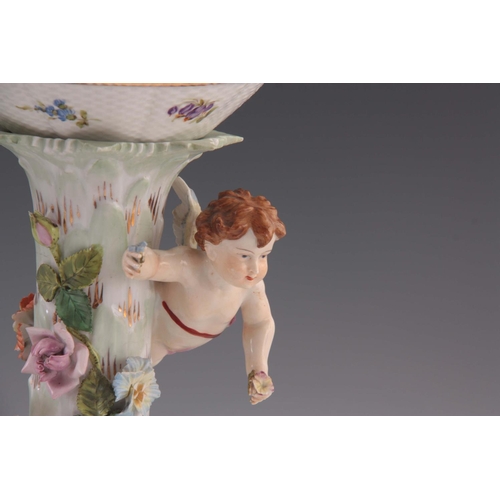 97 - TWO 19TH CENTURY DRESDEN PORCELAIN COMPOTE CENTREPIECES with figural cherub bases and pierced basket... 