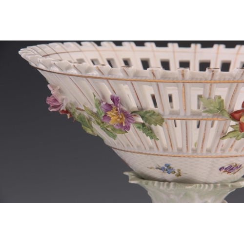 97 - TWO 19TH CENTURY DRESDEN PORCELAIN COMPOTE CENTREPIECES with figural cherub bases and pierced basket... 