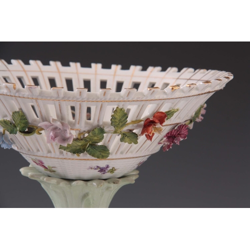 97 - TWO 19TH CENTURY DRESDEN PORCELAIN COMPOTE CENTREPIECES with figural cherub bases and pierced basket... 