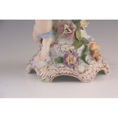 97 - TWO 19TH CENTURY DRESDEN PORCELAIN COMPOTE CENTREPIECES with figural cherub bases and pierced basket... 