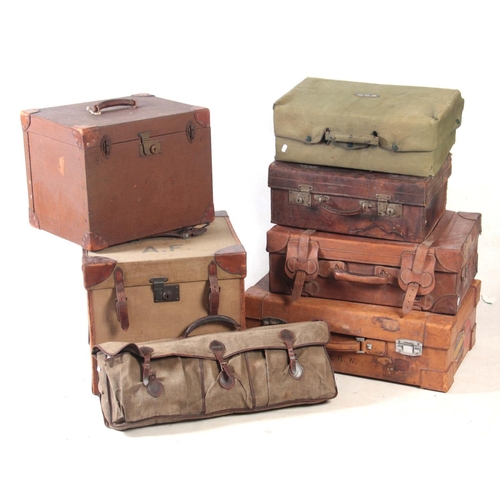 1129 - A SELECTION OF VINTAGE LEATHER AND CANVAS LUGGAGE