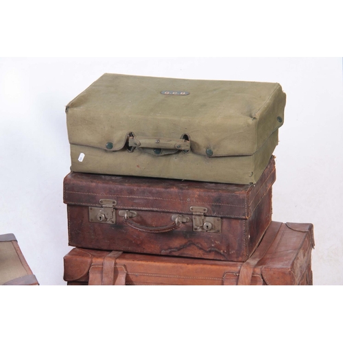 1129 - A SELECTION OF VINTAGE LEATHER AND CANVAS LUGGAGE