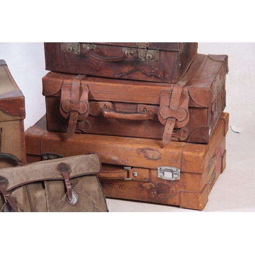 1129 - A SELECTION OF VINTAGE LEATHER AND CANVAS LUGGAGE