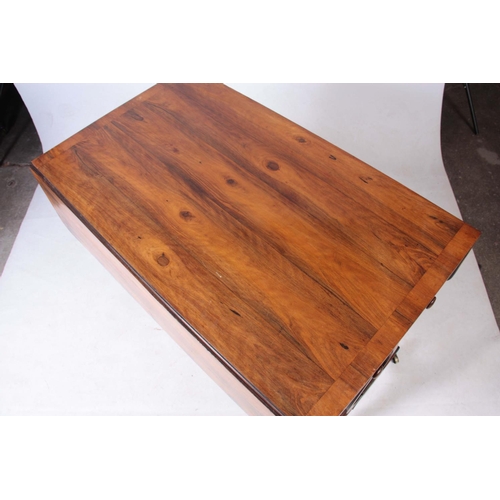 1132 - AN UNUSUAL REGENCY OLIVE WOOD SOFA TABLE the hinged top having a cross-banded edge and two end drawe... 