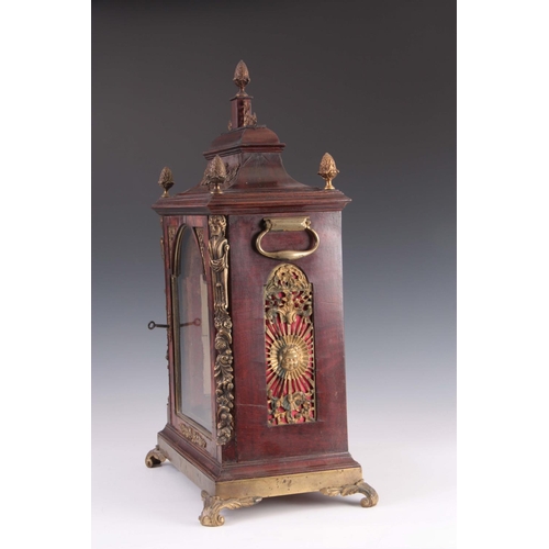 935 - A GEORGE III FIGURED MAHOGANY AND ORMOLU MOUNTED BELL TOP BRACKET CLOCK CASE having gilt brass pinea... 