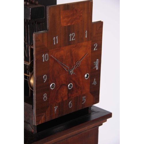 936 - A 1930's ART DECO GRANDAUGHTER CLOCK the case with sliding hood enclosing a walnut dial with chrome ... 