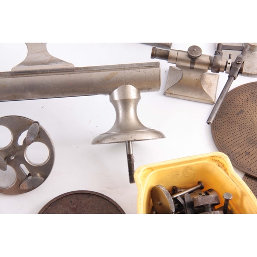 943 - A VINTAGE STEEL WATCHMAKERS LATHE with wheel cutting attachments and various components  42cm wide