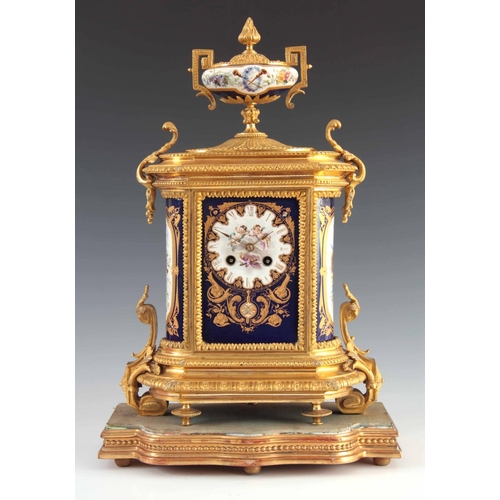 944 - A LATE 19TH CENTURY FRENCH ORMOLU AND PORCELAIN PANEL MANTEL CLOCK the gilt brass case with chased l... 