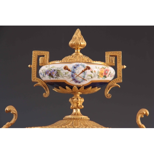 944 - A LATE 19TH CENTURY FRENCH ORMOLU AND PORCELAIN PANEL MANTEL CLOCK the gilt brass case with chased l... 