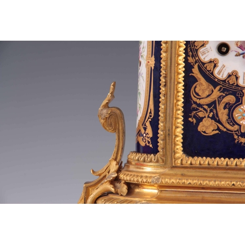 944 - A LATE 19TH CENTURY FRENCH ORMOLU AND PORCELAIN PANEL MANTEL CLOCK the gilt brass case with chased l... 