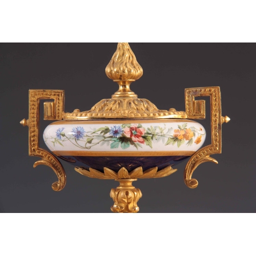 944 - A LATE 19TH CENTURY FRENCH ORMOLU AND PORCELAIN PANEL MANTEL CLOCK the gilt brass case with chased l... 