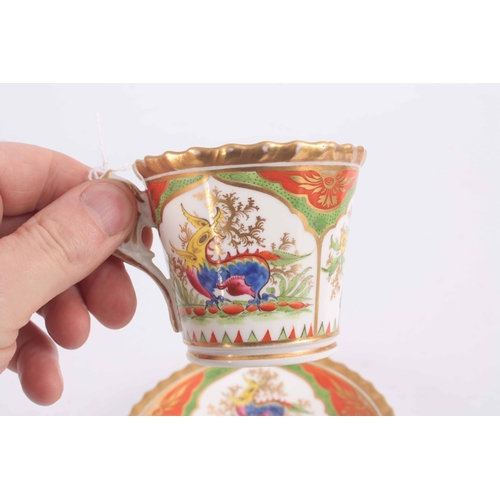 107 - A colourful Chamberlain & Co Worcester Porcelain CABINET CUP and SAUCERÊwith moulded gilt edge borde... 