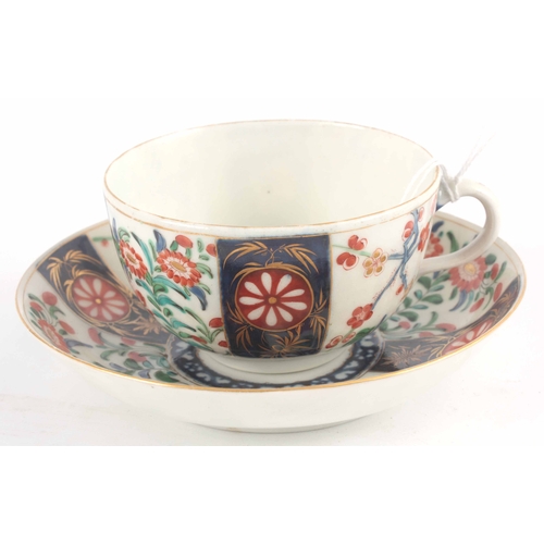 110 - A First Period Polychrome Worcester TEA CUP and SAUCER with colourful flower spray decoration in the... 