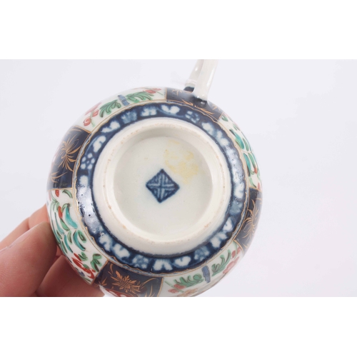 110 - A First Period Polychrome Worcester TEA CUP and SAUCER with colourful flower spray decoration in the... 