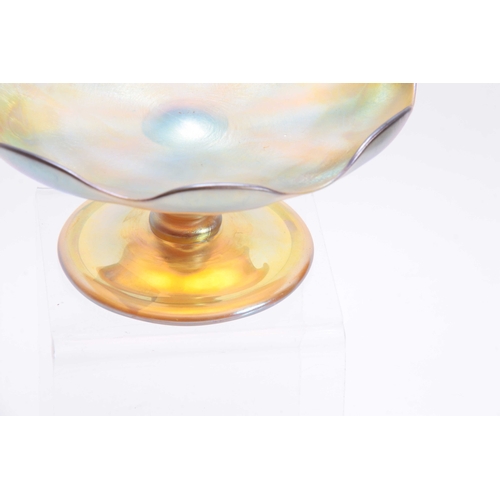 18 - A TIFFANY, FAVRILE IRIDESCENT GLASS FOOTED COMPOTE with baluster stem, plain folded foot and moulded... 