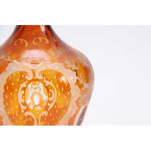 3 - A LATE 19THCENTURY BOHEMIAN SILVER MOUNTED AMBER DECANTER AND STOPPER the clear oval panelled balust... 