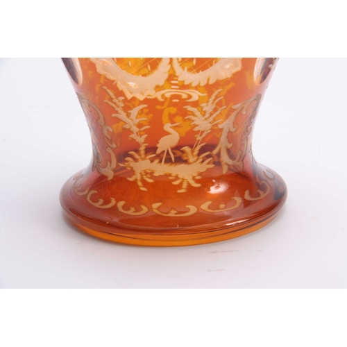 3 - A LATE 19THCENTURY BOHEMIAN SILVER MOUNTED AMBER DECANTER AND STOPPER the clear oval panelled balust... 