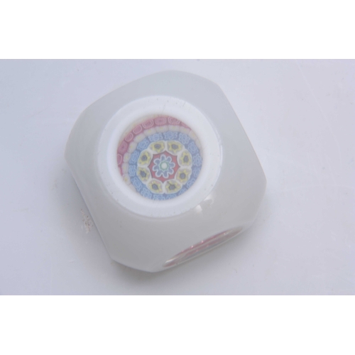 7 - A 19TH CENTURY MILLEFIORI WHITE OPAQUE CASED GLASS PAPERWEIGHT with clear oval side panels and circu... 