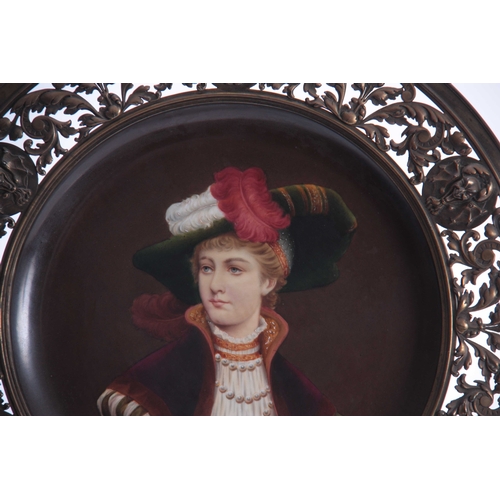 104 - A 19THCENTURY CONTINENTAL PORCELAIN PORTRAIT PLAQUE WITH BRONZED  METAL MOUNT finely painted with a ... 