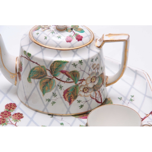 107 - A 20TH CENTURY CONTINENTAL PORCELAIN TEA FOR TWO SET comprising of a tray, two cups and saucers, sug... 