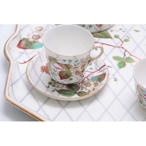 107 - A 20TH CENTURY CONTINENTAL PORCELAIN TEA FOR TWO SET comprising of a tray, two cups and saucers, sug... 