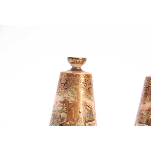 109 - A FINE PAIR OF JAPANESE MEIJI PERIOD SATSUMA TAPPERING VASES by Koshida decorated with figure panels... 