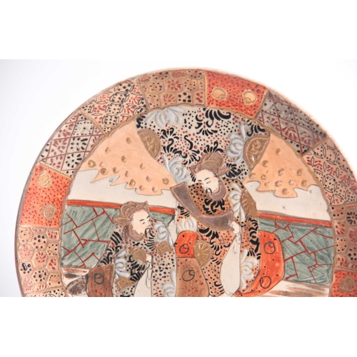 119 - A SATSUMA SHALLOW DISH AND CABINET PLATE each with figural panelled centres highlighted in gold with... 