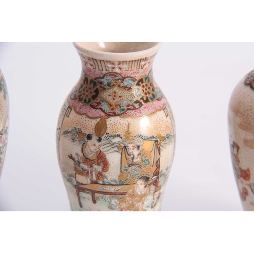 122 - A GROUP OF THREE SMALL SATSUMA CABINET VASES with figures in a continuous landscape scene enclosed b... 