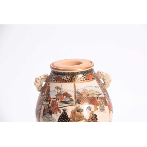 124 - A JAPANESE MEIJI PERIOD SATSUMA CAULDRON SHAPED VASE WITH TERRACOTTA INSET TOP decorated figures and... 