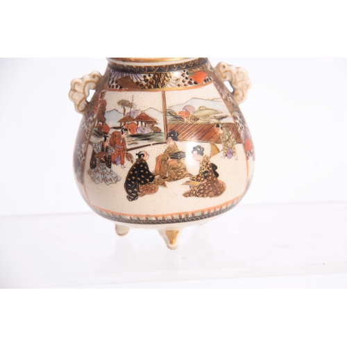 124 - A JAPANESE MEIJI PERIOD SATSUMA CAULDRON SHAPED VASE WITH TERRACOTTA INSET TOP decorated figures and... 