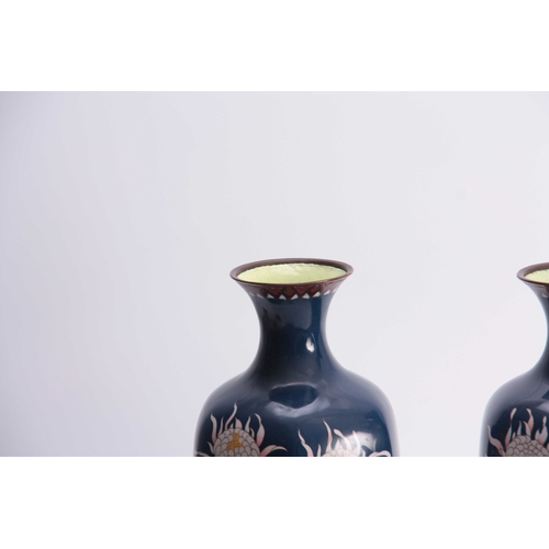 130 - A LARGE PAIR OF CHINESE DARK BLUE GROUND HEXAGONAL TAPERING SHOULDERED VASES with extensive flower s... 