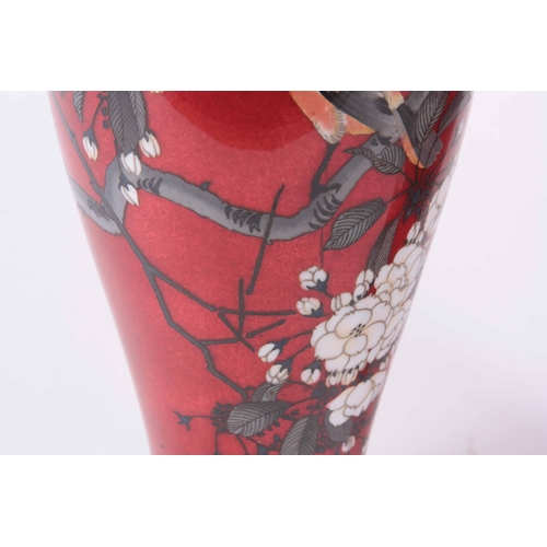 136 - A PAIR OF LATE 19TH CENTURY JAPANESE CLOISONNE VASES red ground decorated with birds on floral branc... 