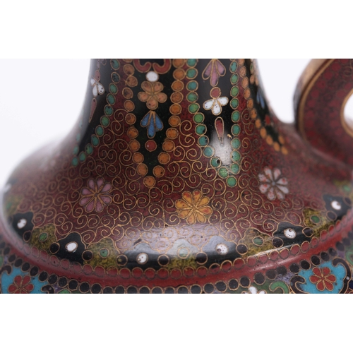 139 - AN ORIENTAL CLOISONNE ENAMEL FLATTENED OVOID EWER WITH SLENDER NECK finely decorated with floral pan... 