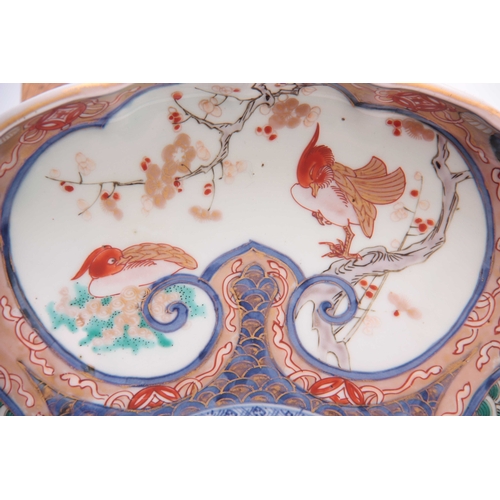 142 - A 19TH CENTURY IMARI SCALLOP EDGED DISH colourfully decorated with birds and floral decoration, sign... 