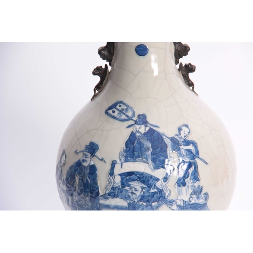 158 - A 19TH CENTURY CHINESE CRACKLE GLAZED VASE with relief decorated blue & white figures to the front a... 