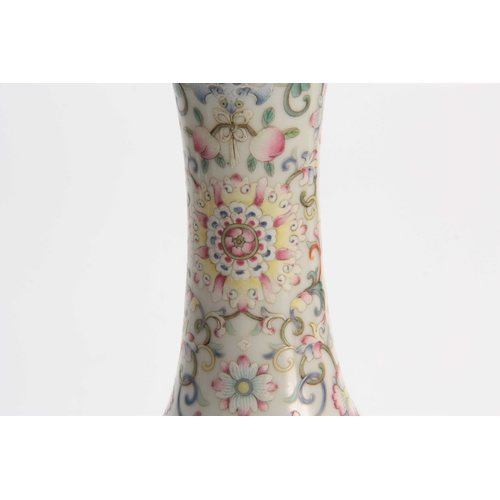 173 - A CHINESE REPUBLIC FAMILLE ROSE VASE decorated with flowers and blossoming trees with a pale blue in... 