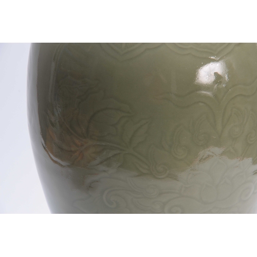 176 - A CHINESE CELEDON BULBOUS VASE with floral decoration 59cm high.