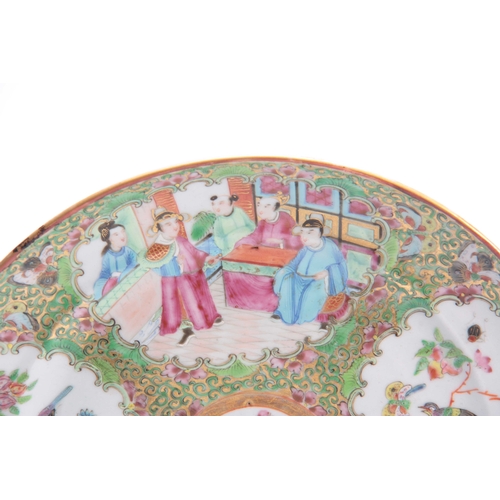 181 - A 19TH CENTURY CIRCULAR CHINESE CANTON PLATE decorated with panels of figures in garden settings and... 