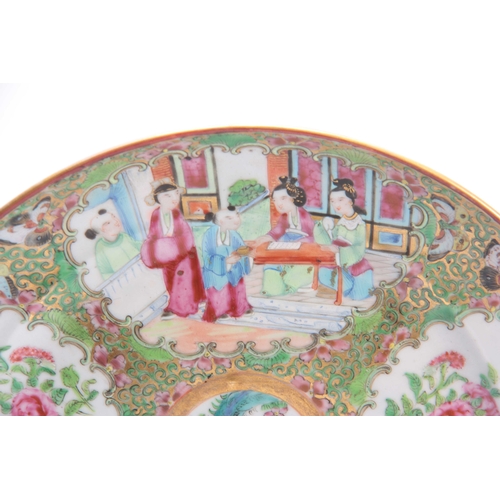 181 - A 19TH CENTURY CIRCULAR CHINESE CANTON PLATE decorated with panels of figures in garden settings and... 