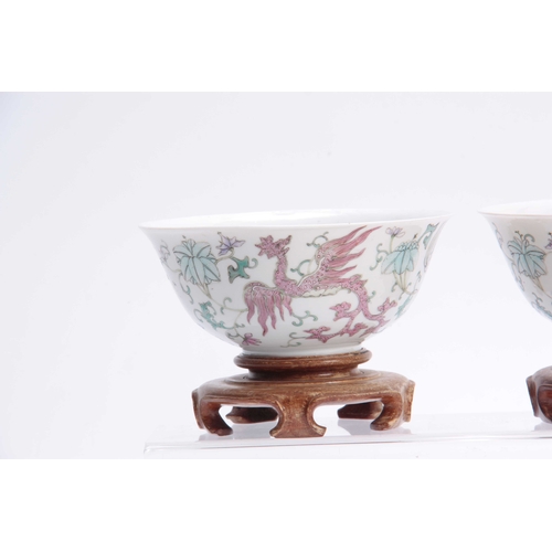 182 - A PAIR OF LATE 19TH CENTURY CHINESE PORCELAIN BOWLS depicting coloured dragons and floral decoration... 