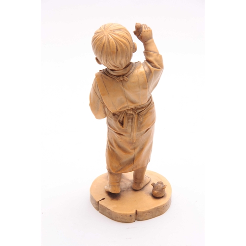 194 - A JAPANESE MEIJI PERIOD CARVED IVORY OKIMONO OF A YOUNG BOY PLAYING WITH BIRDS signed with character... 