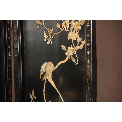 222 - AN EARLY 20TH CENTURY CHINESE SIX SECTIONAL HINGED PANELLED EBONISED AND MOTHER OF PEARL SCREEN deco... 